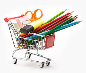Caddy with school equipment on white background